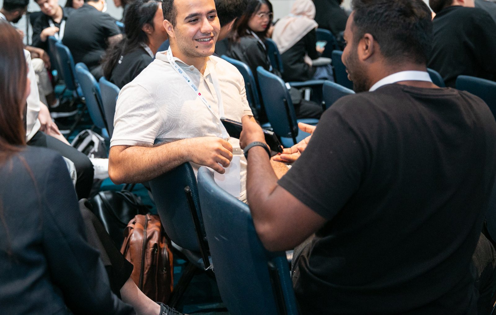 Delegates talking between sessions
